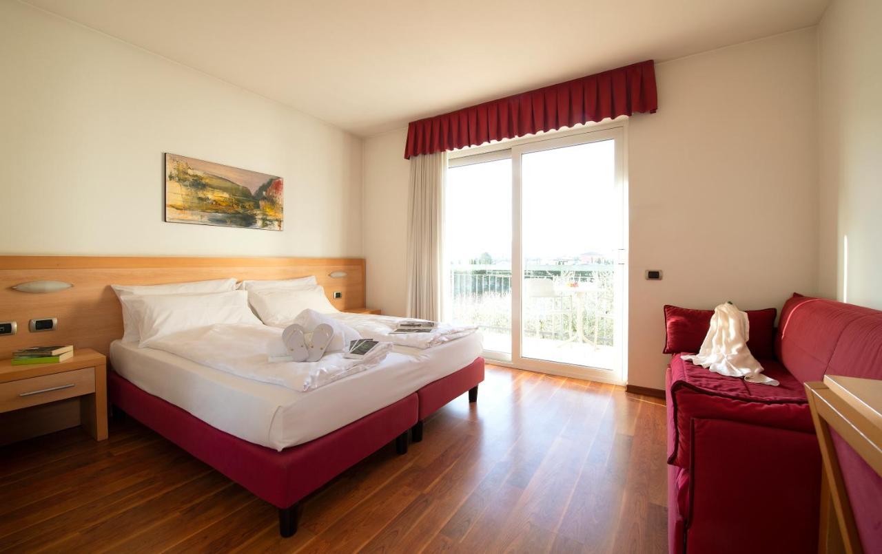 Hotel Al Maso Riva del Garda Rum bild